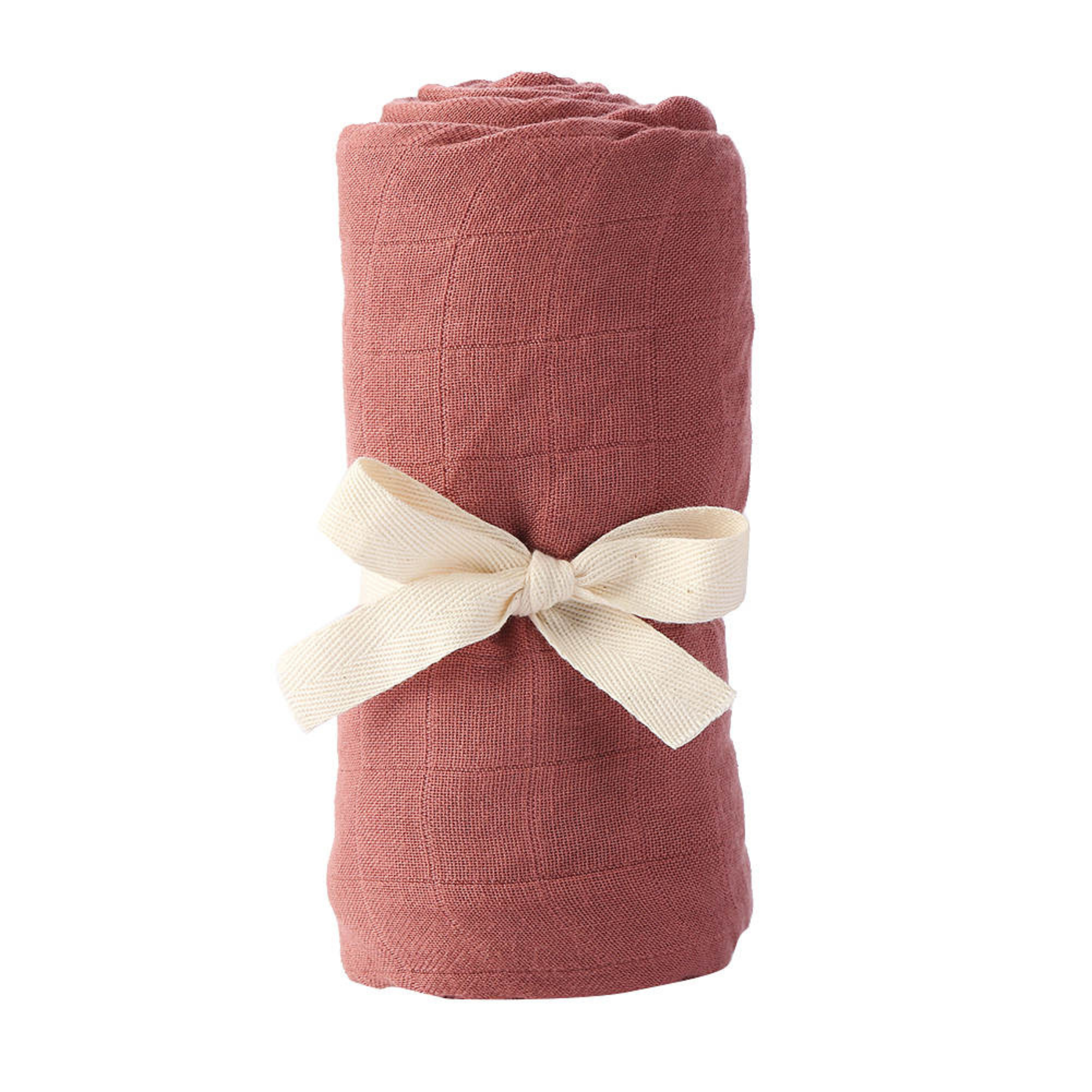 Giften Market Bamboo Muslin Baby Swaddle in dusty rose, rolled and tied with a bow, sustainably made and ultra-soft for newborns.