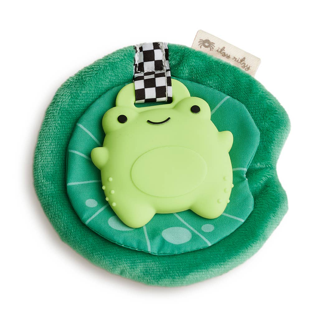 Itzy Teether Frog Sweetie Crinkle™ in green, featuring a silicone frog and soft plush leaves for sensory fun.