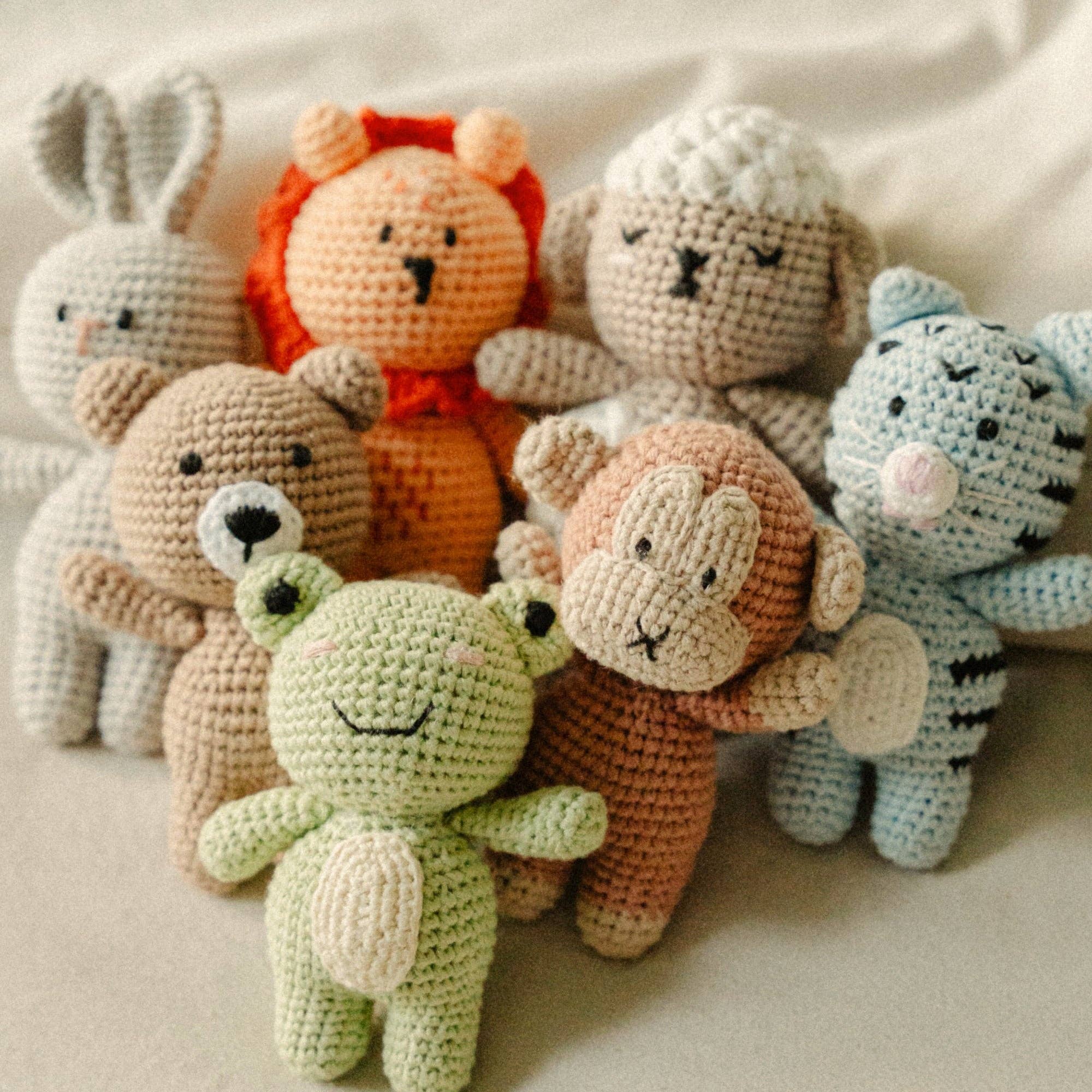Adorable crochet animal toys including Georgie the Groggy Froggy and friends, perfect for imaginative play and cuddles!