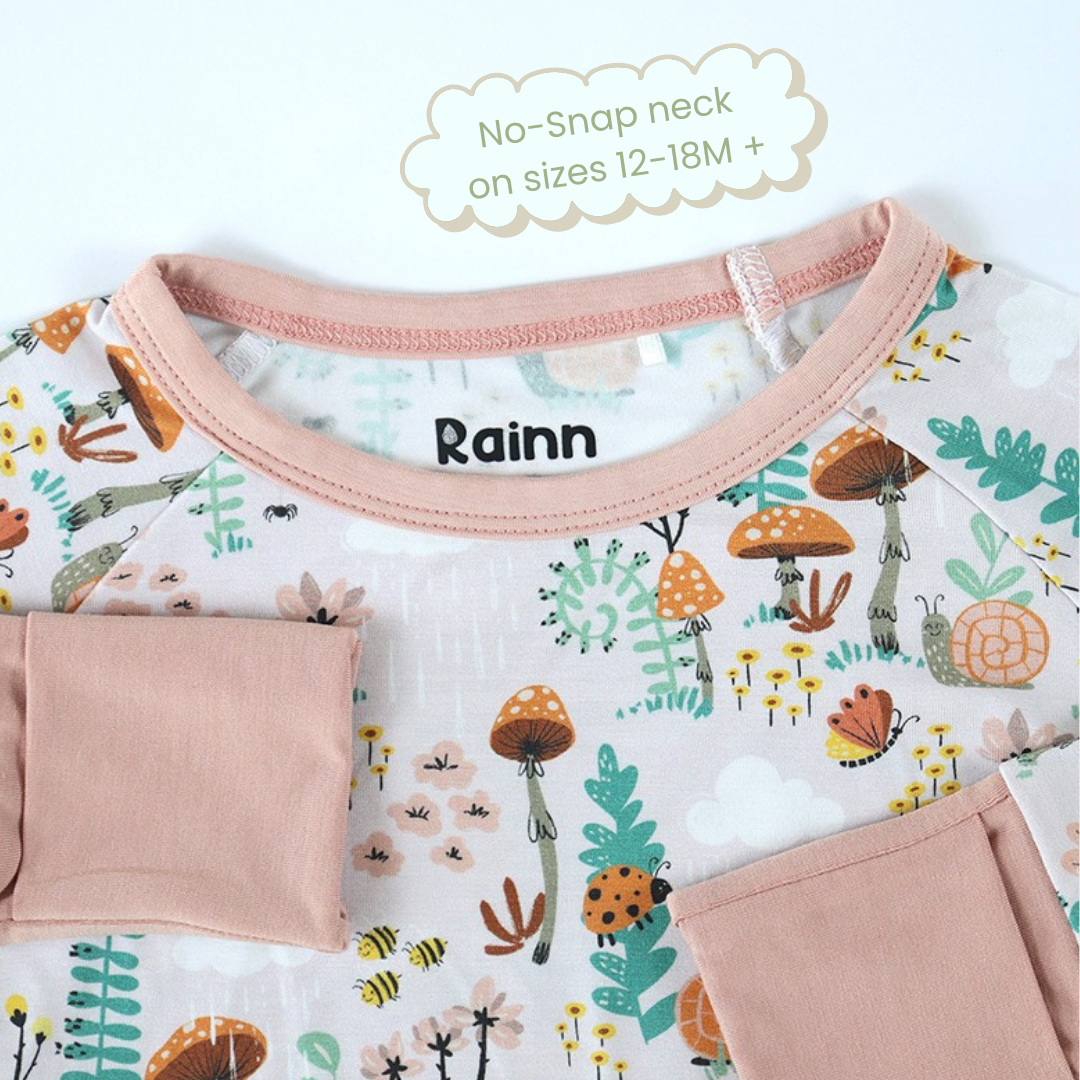 Bamboo crescent zipp jammies in fern pattern for sizes 12-18M, breathable, hypoallergenic, and eco-friendly sleepwear.