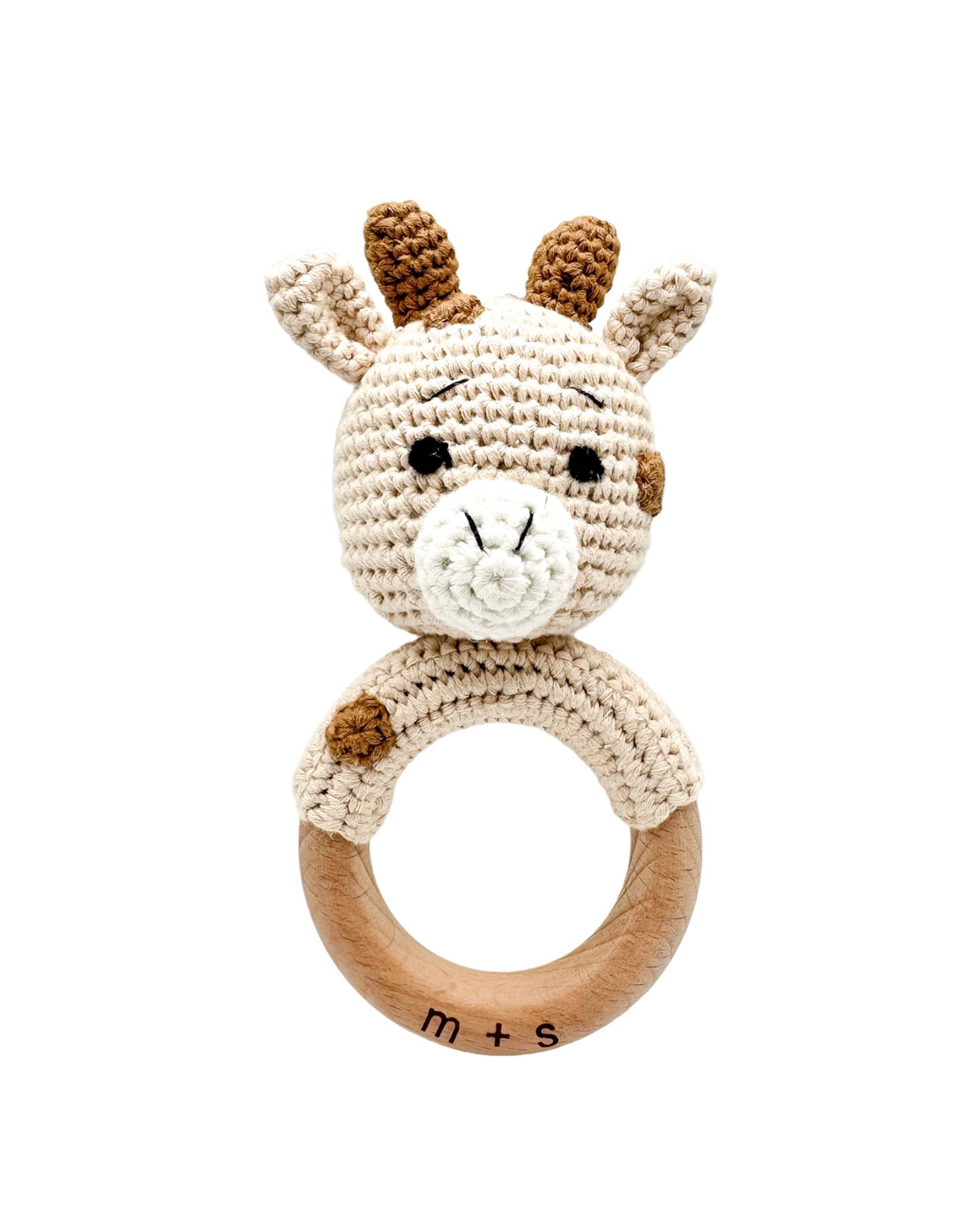 Handmade crochet giraffe rattle by Marlowe and Sage. Perfect sensory toy for newborns to toddlers.