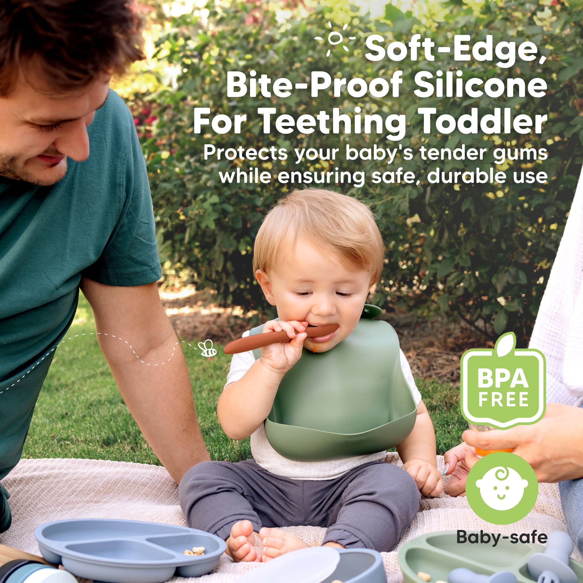 Toddler using KeaBabies Silicone Baby Spoons outdoors, showcasing BPA-free utensil's safe, soft design for teething babies.