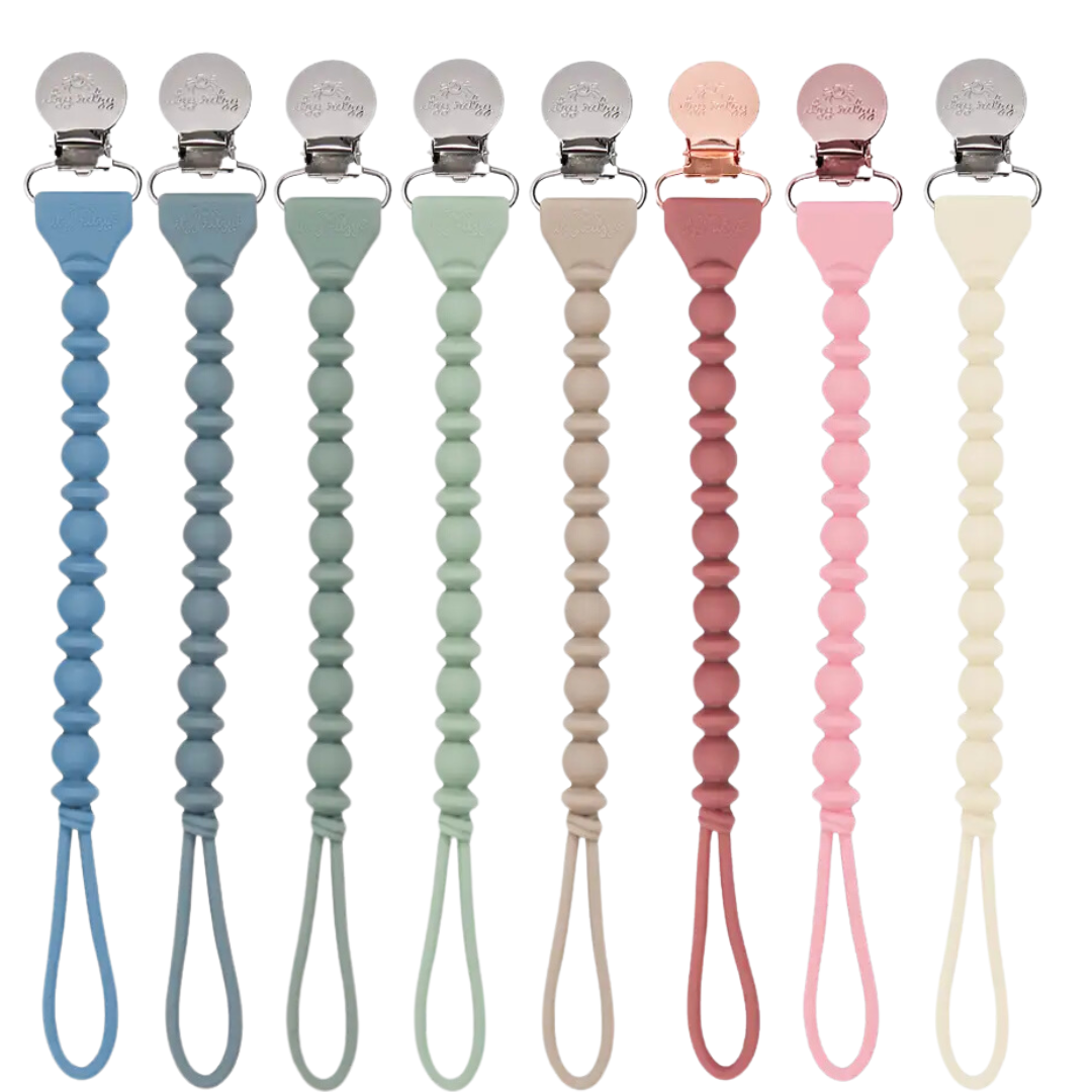 Colorful Sweetie Strap™ silicone pacifier clips in braided designs for stylish baby gear and secure pacifier storage.