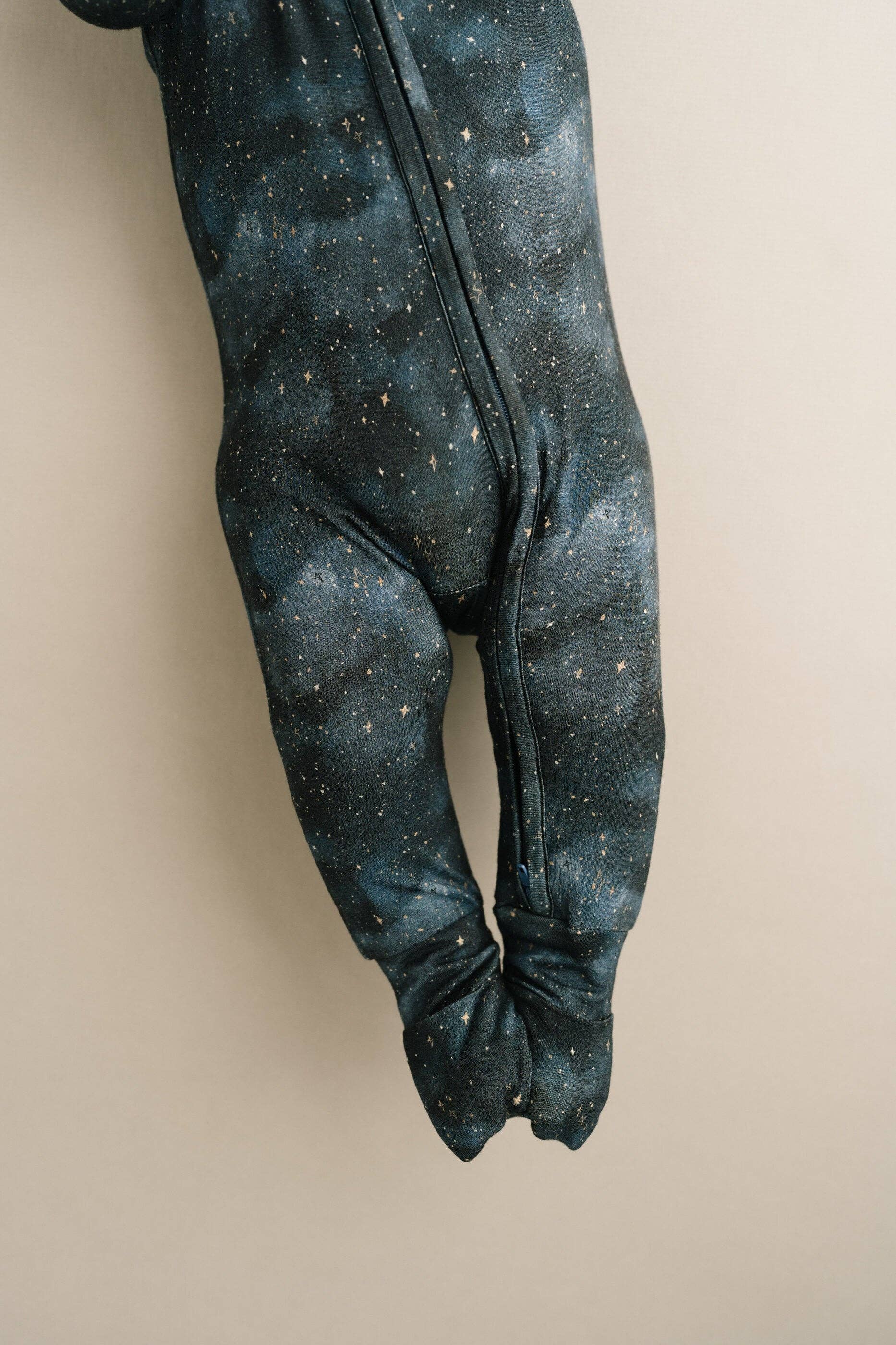 "Little One Shop's Moonlight Bamboo Sleeper - 6-12M in dark starry pattern, full-length view showing cozy, stretchy material."