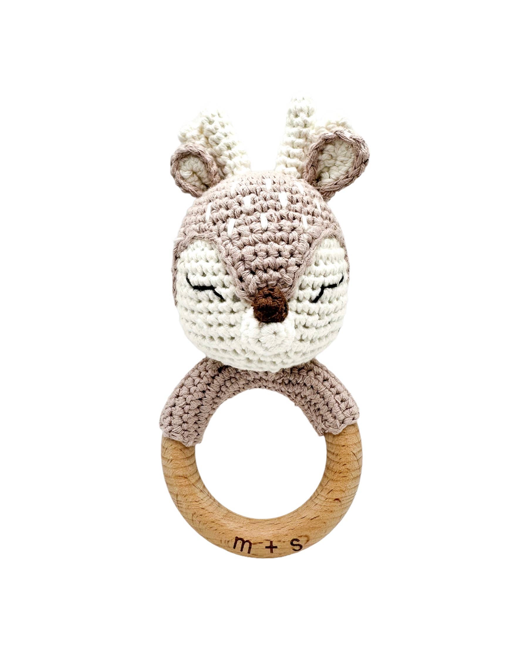 Handmade deer crochet rattle with wooden ring, eco-friendly sensory toy for newborns to 2-year-olds by Marlowe and Sage LLC.