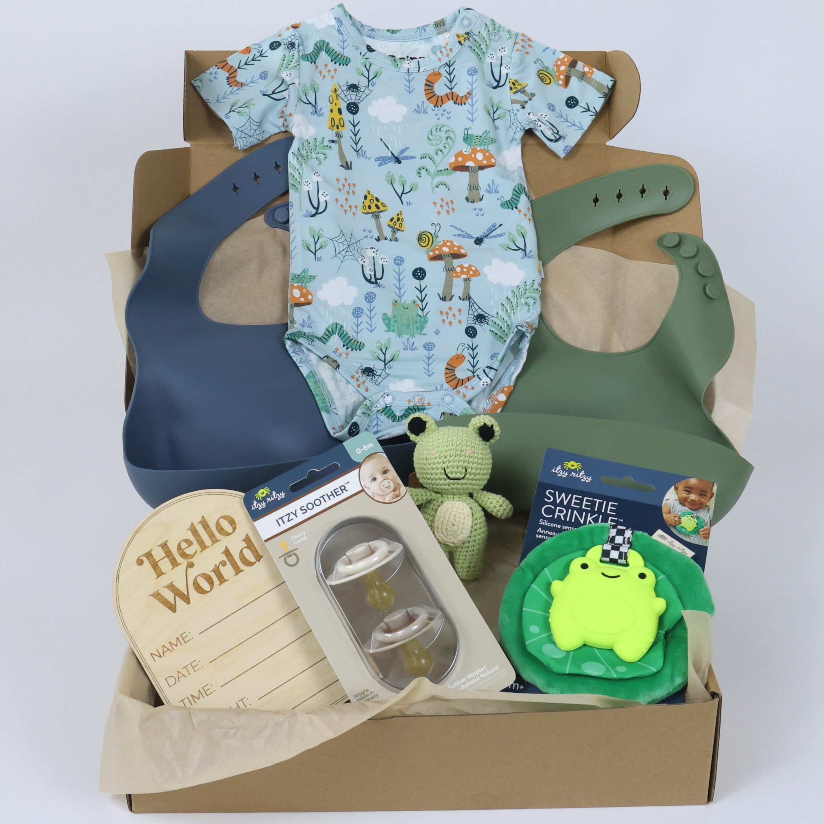 Eco-Friendly Baby Gift Set - Critter Hollow featuring bamboo blend essentials, bibs, toy, and bodysuit in a decorative box.